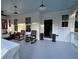 Inviting porch featuring rocking chairs, a blue ceiling, and stylish decor, perfect for relaxing outdoors at 3240 Columbia Oaks Way, Decatur, GA 30032