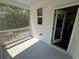 Relaxing screened porch with gray painted floors providing a tranquil outdoor living space at 3240 Columbia Oaks Way, Decatur, GA 30032