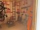 Organized shed interior with a variety of equipment and storage solutions, perfect for DIY projects and hobbies at 3240 Columbia Oaks Way, Decatur, GA 30032
