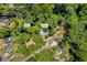 Aerial view of the home and shed on a 1.04 acre lot with a defined perimeter at 6235 Akins Way, Cumming, GA 30041