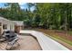 Spacious backyard deck providing ample space for outdoor seating and entertaining at 630 Buttercup Trce, Johns Creek, GA 30022