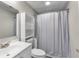 A cozy bathroom with an updated sink, vanity, and modern toilet at 630 Buttercup Trce, Johns Creek, GA 30022