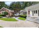 Charming home exterior featuring a beautifully landscaped front yard and welcoming front porch at 630 Buttercup Trce, Johns Creek, GA 30022
