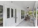 Charming front porch with seating area, offering a relaxing and inviting space at 630 Buttercup Trce, Johns Creek, GA 30022