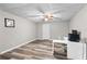 This office has an eye-catching ceiling and light wood-look flooring at 630 Buttercup Trce, Johns Creek, GA 30022