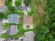 Aerial view of a property with a well-maintained lawn and landscaping at 2111 Nelms Pointe Lndg, Lawrenceville, GA 30043