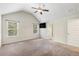 Spacious bedroom with vaulted ceiling, neutral carpet, and ensuite bathroom at 2149 Apple Orchard Way, Austell, GA 30168