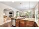 Open concept kitchen with a view to the living room, stainless steel appliances, and granite countertops at 2149 Apple Orchard Way, Austell, GA 30168