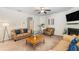 Relaxing living room with plush sofas, a fireplace, and a TV for entertainment at 2149 Apple Orchard Way, Austell, GA 30168