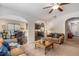 Comfortable living room with hardwood floors, plush sofas, and an open floorplan at 2149 Apple Orchard Way, Austell, GA 30168