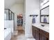 Bathroom with double vanity, tub, stand up shower, and walk-in closet at 2490 Tack Hill Ct, Dacula, GA 30019
