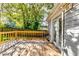 Outdoor deck with a grill, perfect for entertaining, with access from french doors, and fenced in for privacy at 2876 Randall St, East Point, GA 30344