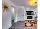 Bright living room with modern decor, an electric fireplace, and an open floor plan at 2876 Randall St, East Point, GA 30344