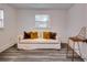 Cozy living room featuring modern flooring, neutral tones, and a comfortable seating area with natural lighting at 2876 Randall St, East Point, GA 30344