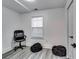 Functional office space with natural light and room for comfortable seating, perfect for a productive work environment at 2876 Randall St, East Point, GA 30344