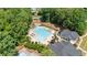 A bird's-eye view shows the immaculate pool and recreation center at 3902 Butterstream Way, Kennesaw, GA 30144