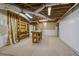 Unfinished basement area with exposed wood framing, open ceiling, and utility access at 3902 Butterstream Way, Kennesaw, GA 30144
