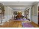 Formal dining room with hardwood floors, traditional decor, and plenty of space for entertaining at 3902 Butterstream Way, Kennesaw, GA 30144