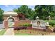 Community entrance sign for Legacy Park with brick pillars and lush landscaping at 3902 Butterstream Way, Kennesaw, GA 30144