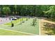 An open-air exercise park featuring various workout machines and artificial turf at 3902 Butterstream Way, Kennesaw, GA 30144