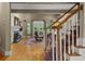 Spacious living room featuring hardwood floors, a fireplace, and access to outdoor patio at 3902 Butterstream Way, Kennesaw, GA 30144