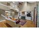 Spacious living room with fireplace, built-in shelving, and an open view of the staircase at 3902 Butterstream Way, Kennesaw, GA 30144