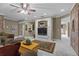 Inviting living room with built-in shelving, fireplace, and plush seating at 3902 Butterstream Way, Kennesaw, GA 30144
