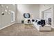 Bright living room with high ceilings, large windows, white sofa, and modern decor at 803 Baugh Springs Ln, Lawrenceville, GA 30044