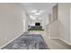 Spacious recreation room area with gray walls, stairs and ample room for activities at 803 Baugh Springs Ln, Lawrenceville, GA 30044