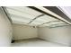 Spacious two-car garage with freshly painted walls and concrete floor at 1540 Ox Bridge Ct, Lawrenceville, GA 30043