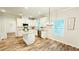 Modern kitchen with stainless steel appliances, island, and granite countertops at 1540 Ox Bridge Ct, Lawrenceville, GA 30043