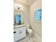 Powder room featuring granite vanity, under sink storage, and tile flooring at 1540 Ox Bridge Ct, Lawrenceville, GA 30043