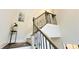 A close up of the staircase featuring decorative iron railings at 1540 Ox Bridge Ct, Lawrenceville, GA 30043