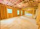 Unfinished basement featuring framing and windows for natural light at 1540 Ox Bridge Ct, Lawrenceville, GA 30043