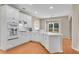 Bright kitchen with white cabinets, and stainless steel appliances at 1712 Bonnabel Ne Trce, Marietta, GA 30066