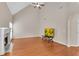 Spacious living room featuring vaulted ceilings, hardwood floors, and a fireplace at 1712 Bonnabel Ne Trce, Marietta, GA 30066