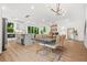 Bright dining area features a modern table, stylish chairs, and an open floorplan at 2926 5Th Sw St, Atlanta, GA 30315