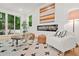 Cozy living room with modern fireplace, stylish furniture, and access to the outdoors at 2926 5Th Sw St, Atlanta, GA 30315
