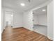 Finished basement with wood floors, and an open layout, perfect for recreation or additional living space at 110 Glen Eagle Way, Mcdonough, GA 30253