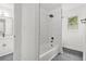 Stylish bathroom with modern tile, bathtub, and a sleek vanity, providing a luxurious feel at 110 Glen Eagle Way, Mcdonough, GA 30253