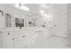 Bright bathroom with double vanity, marble countertops, and tiled shower at 110 Glen Eagle Way, Mcdonough, GA 30253