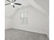 Attic bedroom with carpeted floors and a window at 110 Glen Eagle Way, Mcdonough, GA 30253