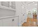Elegant butler's pantry featuring custom cabinets and sleek hardware, perfect for storage and entertaining at 110 Glen Eagle Way, Mcdonough, GA 30253