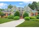 Charming brick and stucco home with manicured lawn and mature landscaping at 110 Glen Eagle Way, Mcdonough, GA 30253