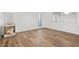 Bright living room featuring hardwood floors, ample natural light, and fresh neutral paint at 110 Glen Eagle Way, Mcdonough, GA 30253