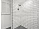 Updated bathroom with a tiled shower and window, enhancing the space with natural light at 110 Glen Eagle Way, Mcdonough, GA 30253