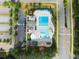 Top-down view of the community pool, parking lot and surrounding streets at 2100 Willshire Gln, Alpharetta, GA 30009