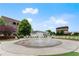 Picturesque town square featuring a central water fountain surrounded by seating and attractive buildings at 2100 Willshire Gln, Alpharetta, GA 30009
