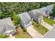 Aerial shot of the house and surrounding neighborhood with mature trees at 3425 Sable Chase Ln, South Fulton, GA 30349