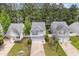 Aerial view showcasing the house, driveway, and surrounding homes in the neighborhood at 3425 Sable Chase Ln, South Fulton, GA 30349